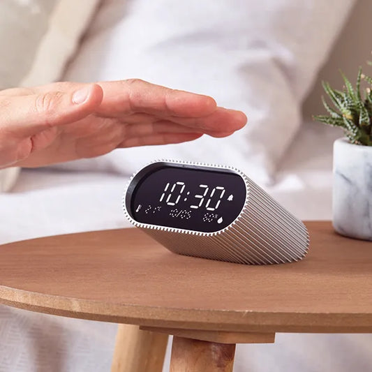 Ray clock doré Lexon 1